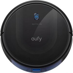 Robot vacuum cleaning dog hair from living room